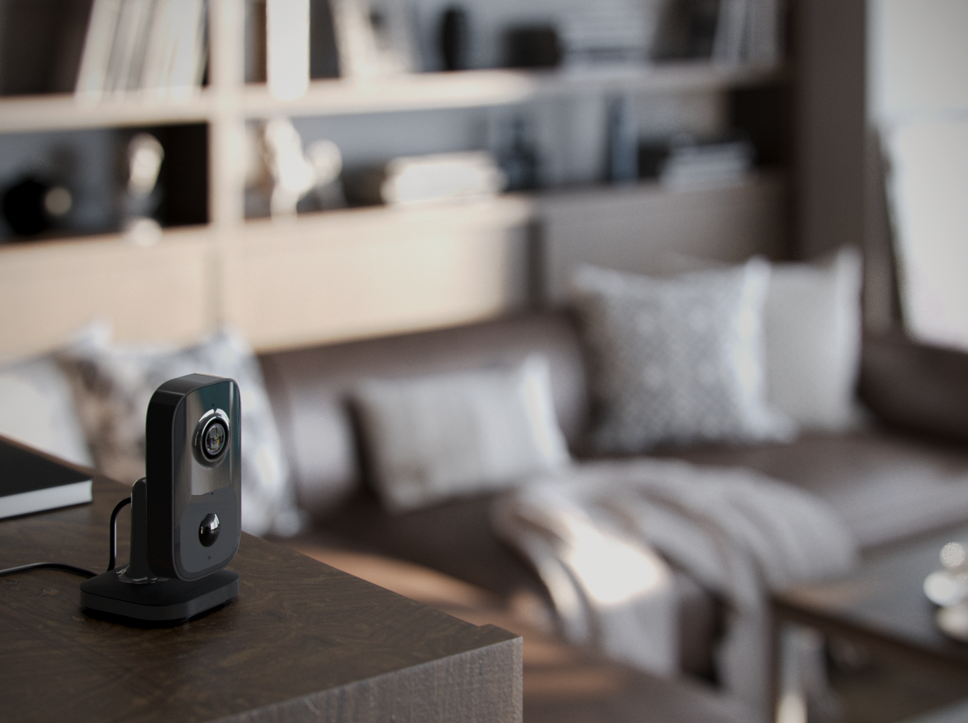 Compact indoor camera on a side table in a living room