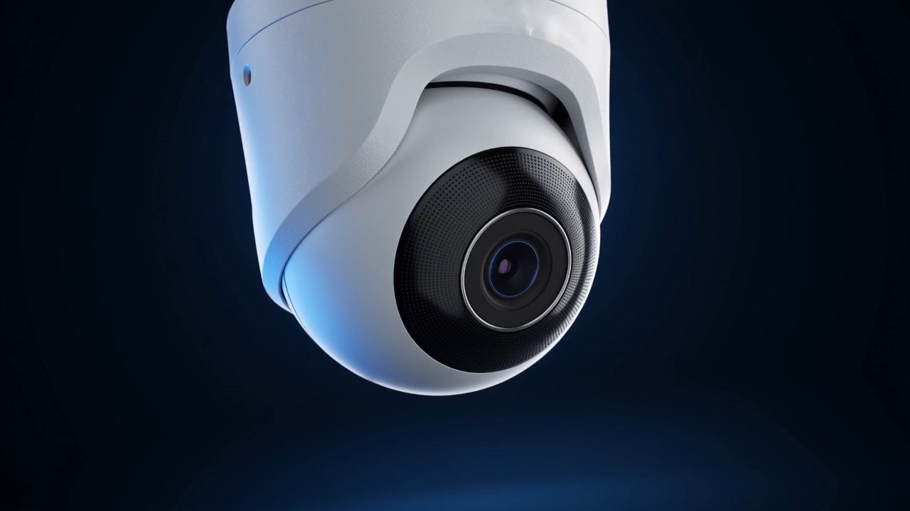 Lumvida turret camera, blue rim-lit against a dark backdrop