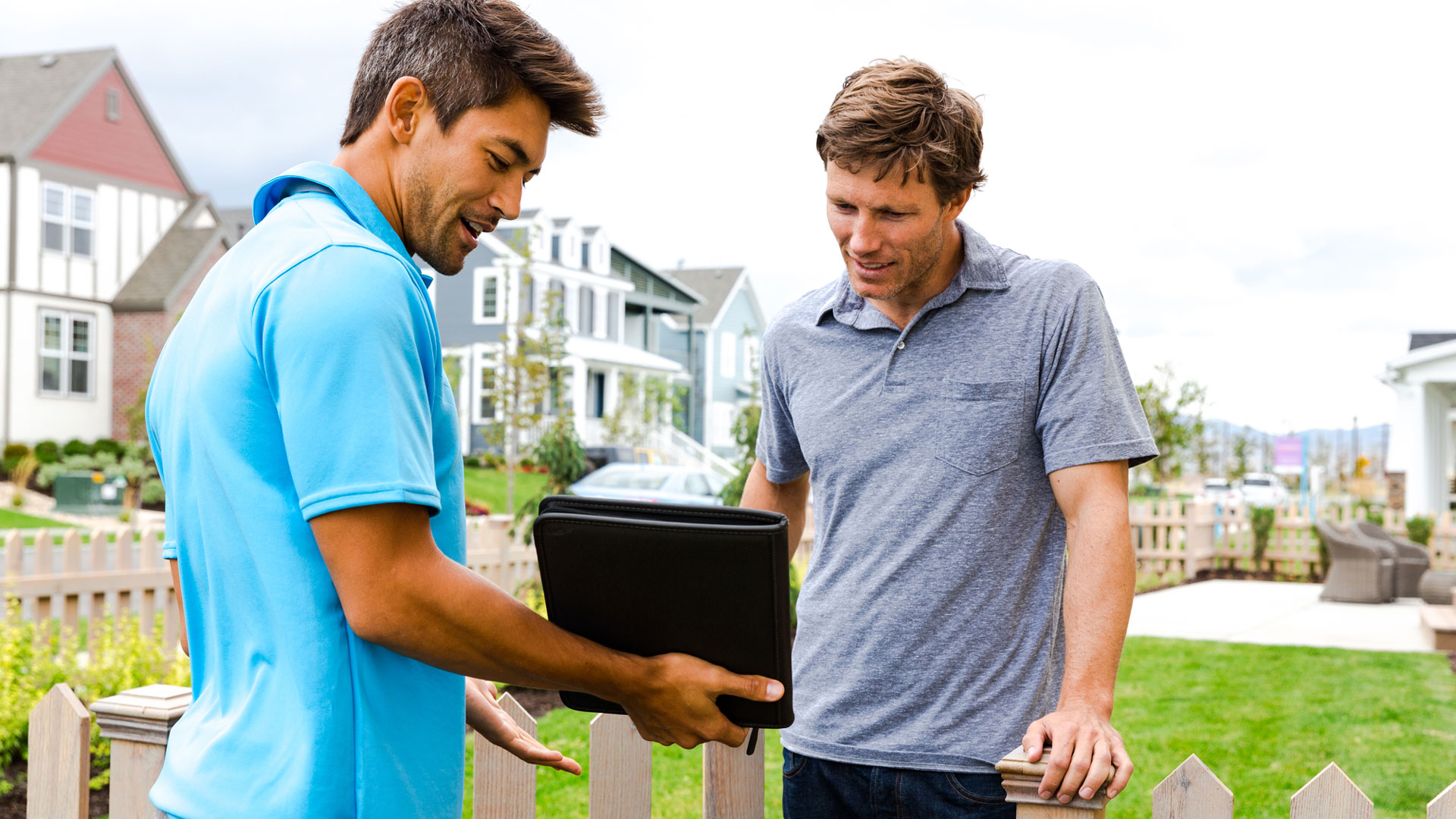 shd_home_redo_rep Safe Home Direct Alarm Salesman showing customer ipad